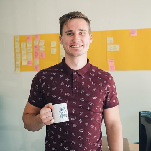 Portrait of Dalius Slamas, Co-Founder of AimRank Tech